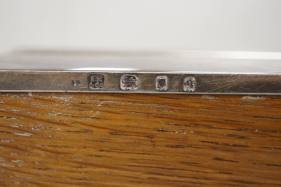 A George V silver mounted rectangular cigarette box, Sampson Mordan & Co, London, 1931, 17cm, with engraved monogram to the cover.